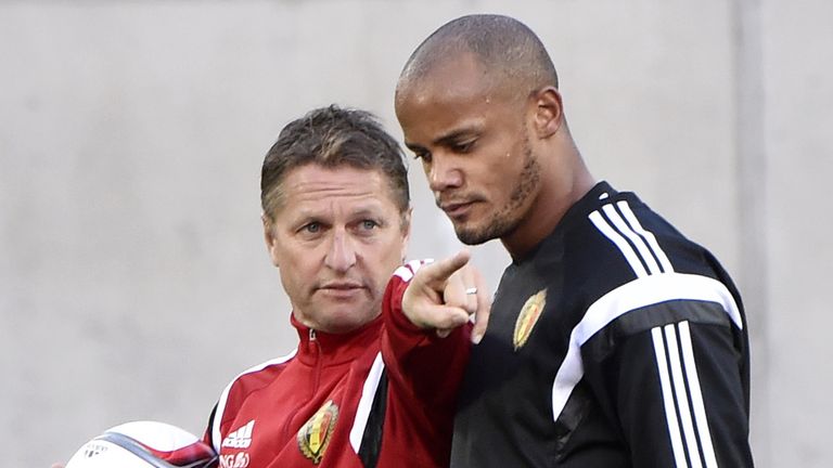 Belgium's coach Marc Wilmots and defender Vincent Kompany 