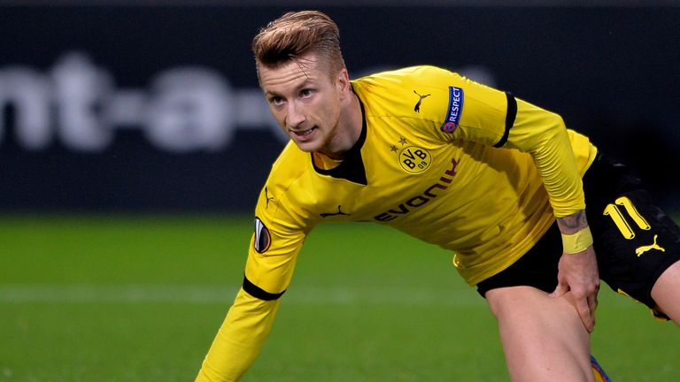 Marco Reus reacts after picking up an injury after scoring opening goal during Europa League group stage match between Borussia Dortmund and Qabala