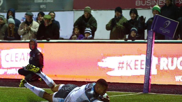 Marcus Watson of Newcastle Falcons scores the 8th try of the game against Enisei-STM