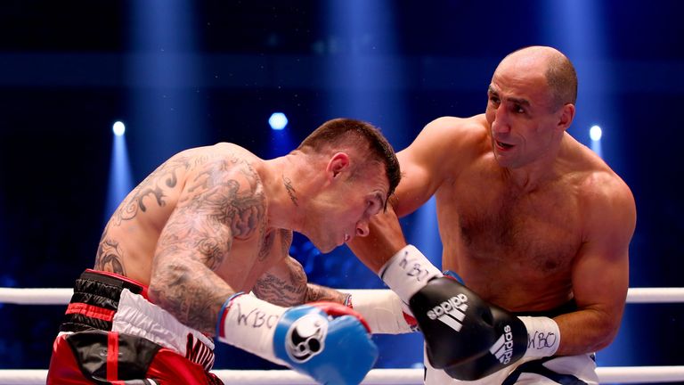 HANOVER, GERMANY - NOVEMBER 21:  Arthur Abraham (R) of Germany and Martin Murray of Great Britain exchange punches
