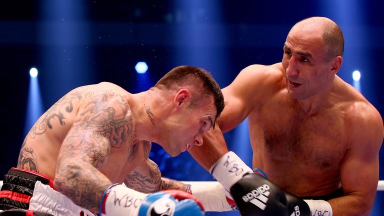 Arthur Abraham (R) of Germany and Martin Murray of Great Britain exchange punches