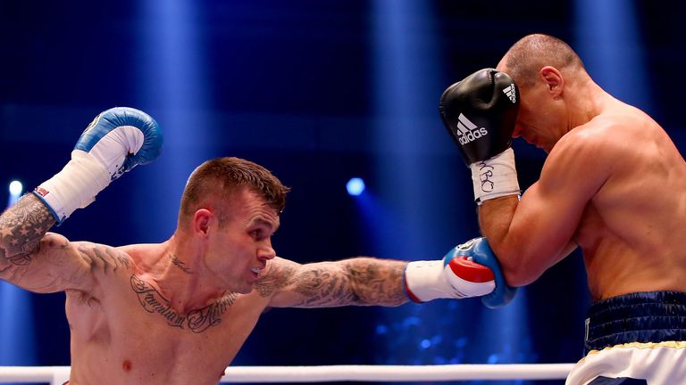 Arthur Abraham (R) of Germany and Martin Murray of Great Britain exchange punches 