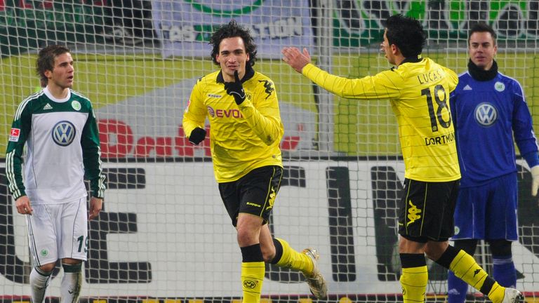 Mats Hummels celebrates making it 3-0 in Borussia Dortmund's Bundesliga win over Wolfsburg in January 2011