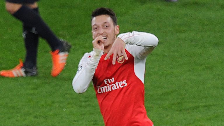 Mesut Ozil celebrates after scoring for Arsenal