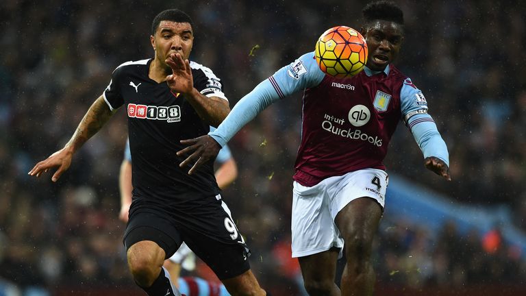 Micah Richards of Aston Villa and Troy Deeney of Watford compete for the ball during the Barclays Premier League match b