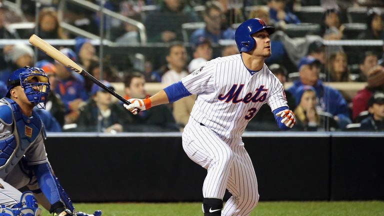 Michael Conforto of the New York Mets hits a a solo home run against Kansas City Royals in World Series