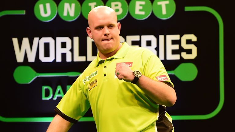 Michael Van Gerwen celebrates as he leads against Peter Wright 