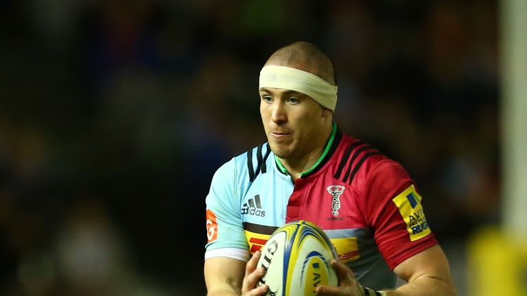 Mike Brown of Harlequins runs with the ball during the Aviva Premiership match between Harlequins and Sale Sharks at Twickenham