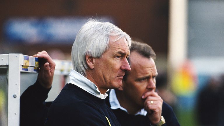 Norwich City manager Mike Walker and assistant John Deehan look on during an FA Premier League match between Wimbledon and Norwich City on March 20, 1993