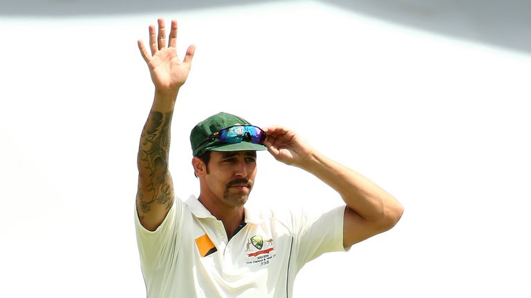 PERTH, AUSTRALIA - NOVEMBER 17:  Mitchell Johnson of Australia waves to family and friends while taking to the field after being dismissed during day five 