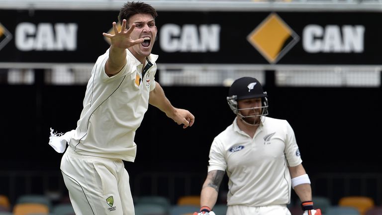 Australia's Mitchell Marsh (L) makes a successful appeal against New Zealand's Brendon McCullum (R)
