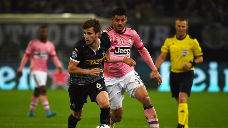 Alvaro Morata (r) has to leave the field to change socks