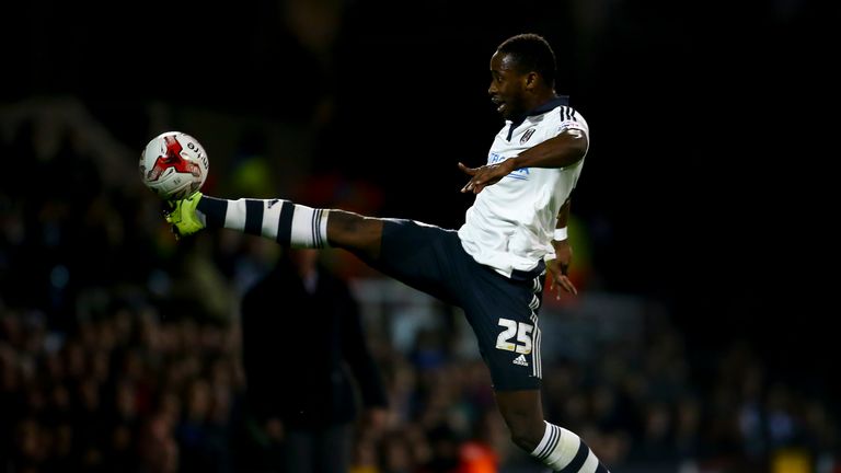 Moussa Dembele of Fulham reaches for a ball