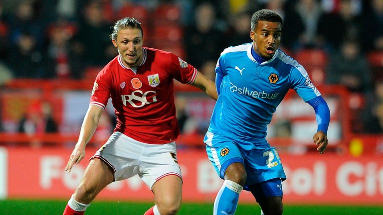 Nathan Byrne of Wolves is closed down by Luke Ayling of Bristol City 