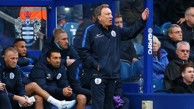 QPR interim head coach Neil Warnock issues instructions from the bench