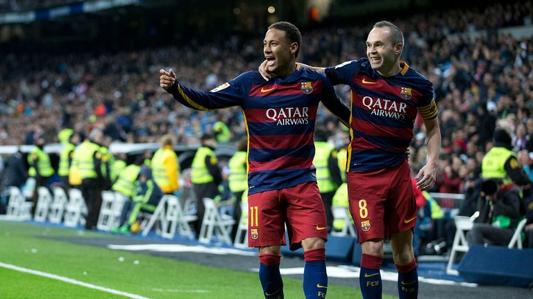 MADRID, SPAIN - NOVEMBER 21:  Neymar JR. (L) of FC Barcelona celebrates scoring their second goal with teammate Andres Iniesta (R) during the La Liga match