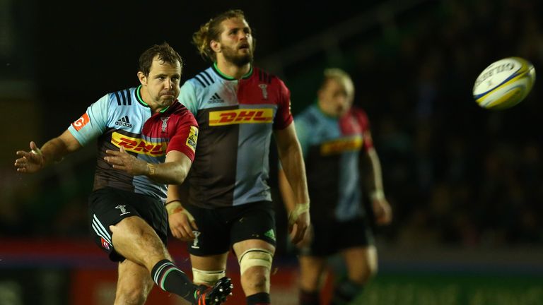 Nick Evans of Harlequins kicks a penalty against Sale Sharks