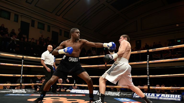 LONDON, ENGLAND - DECEMBER 06:  Ohara Davies (black shorts) defeats Oszkar Fiko during the Lightweight contest at York Hall on December 6, 2014 in London, 
