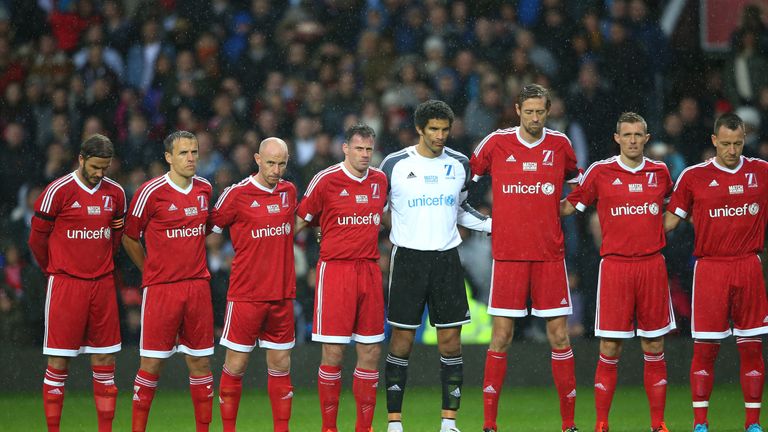 The Great Britain & Ireland team observe a silence