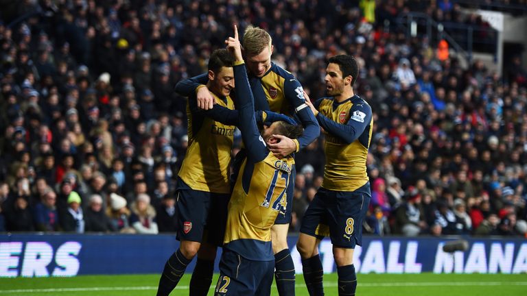 Olivier Giroud of Arsenal celebrates scoring his team's first goal against West Brom.