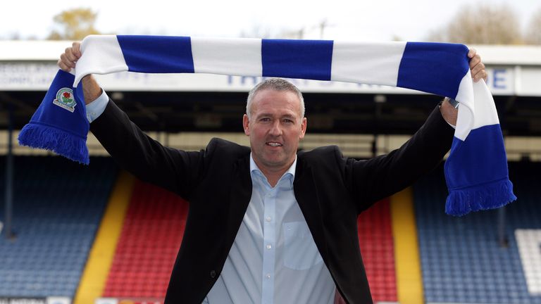 Paul Lambert poses with a Blackburn scarf at Ewood Park