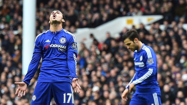 Chelsea midfielder Pedro (left) reacts after missing a shot on goal