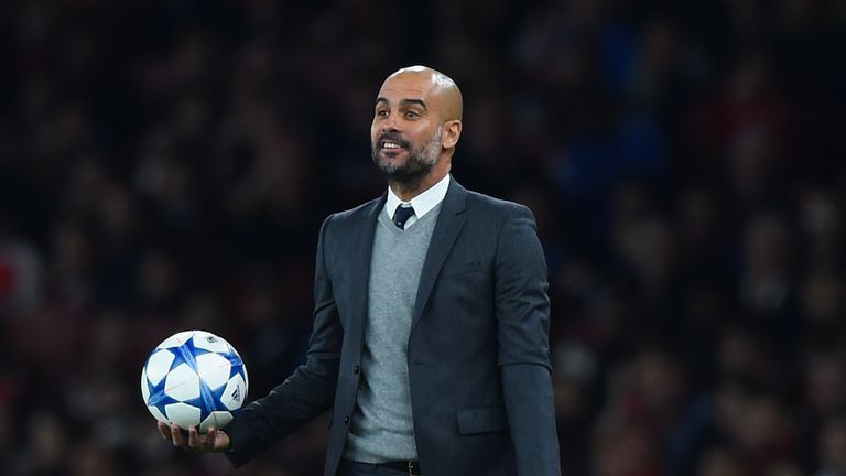 Bayern Munich boss Pep Guardiola reacts during Champions League match against Arsenal at Emirates Stadium on October 20, 2015