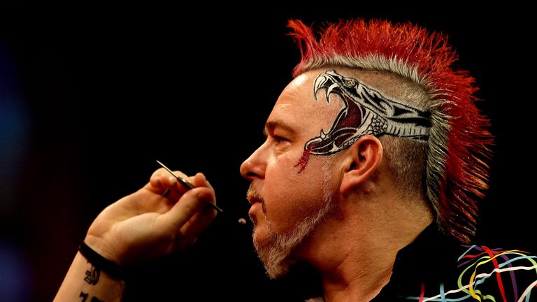Peter Wright of Scotland prepares to throw during the final of the Ladbrokes.com World Darts Championships against Michael va