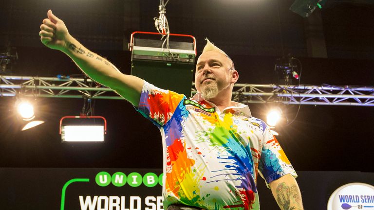 Peter Wright celebrates as he leads against Phil Taylor