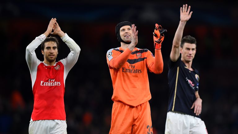 Petr Cech (centre) is in buoyant mood after Arsenal's win over Dinamo Zagreb