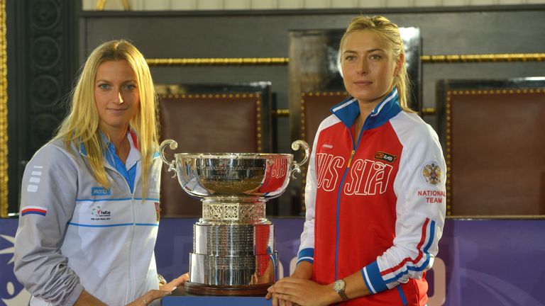 Petra Kvitova (L) of the Czech Fed Cup team poses with Maria Sharapova of the Russian team 