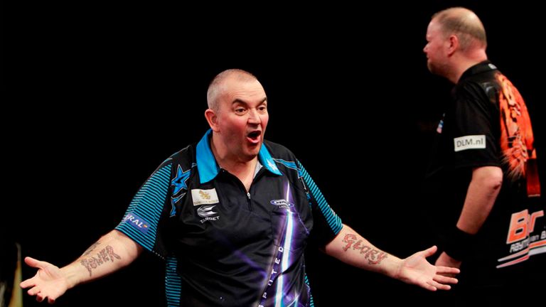 Phil Taylor celebrates his win over Raymond van Barneveld (Pic Lawrence Lustig/PDC)