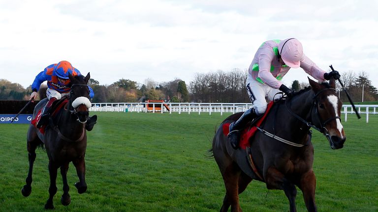 ASCOT, ENGLAND - NOVEMBER 21:  Ruby Walsh riding Vautour (R) clear the last to win The Stella Artois 1965 Steeple Chase from Ptit Zig at Ascot racecourse o