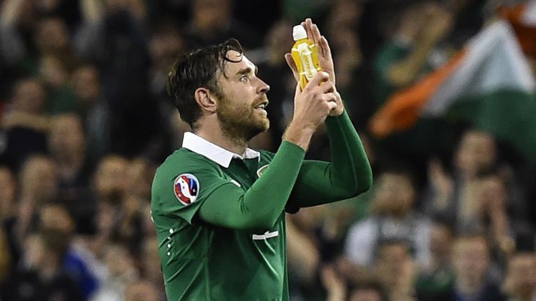 Republic of Ireland's defender Richard Keogh (L) celebrates after winning a UEFA Euro 2016 Group D 