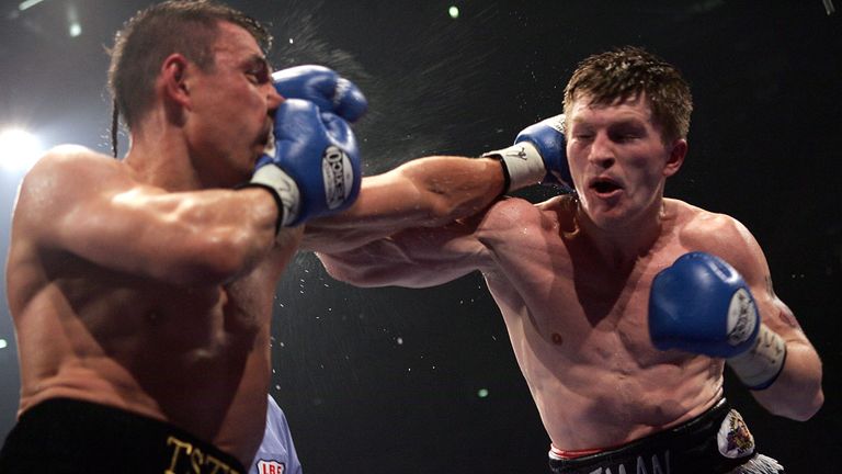 MANCHESTER, ENGLAND - JUNE 4:  Ricky Hatton (R) attacks Kostya Tszyu during the IBF light welterweight title fight at the MEN Arena on June 4, 2005 in Manc