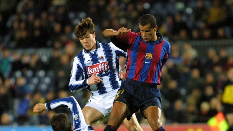 06 Feb 2002:  Xavi Alonso of Real Sociedad and Rivaldo of Barcelona in action during the Primera Liga match between Barcelona and Real Sociedad, played at 