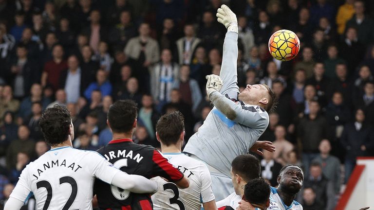Newcastle United goalkeeper Rob Elliot jumps as he attempts to reach the ball following a Bournemouth corner