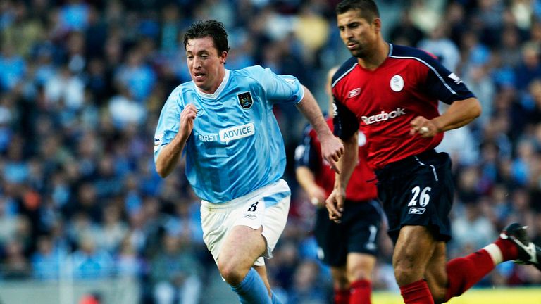 MANCHESTER, ENGLAND - OCTOBER 18:   Robbie Fowler of Man City gets away from Ivan Campo of Bolton during the FA Barclaycard Premiership match between Manch