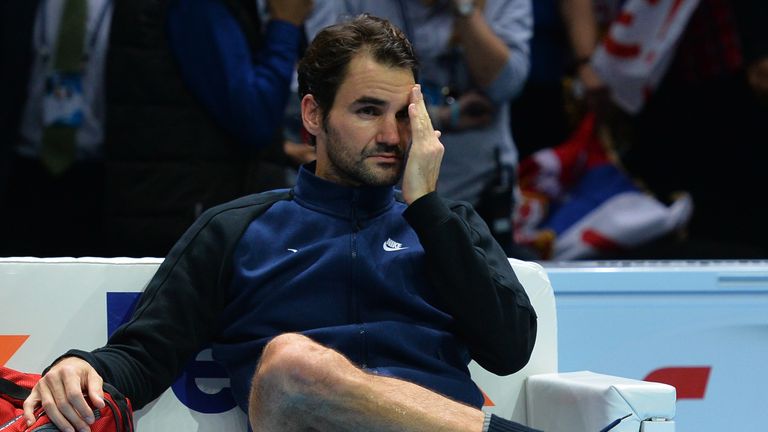 Switzerland's Roger Federer reacts after losing to Serbia's Novak Djokovic