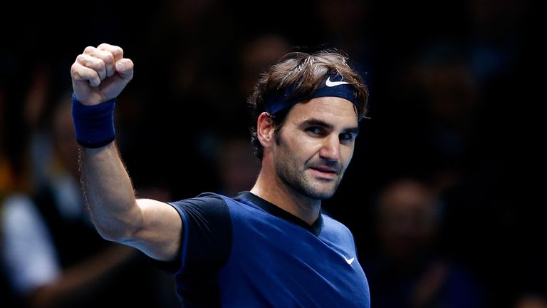 Roger Federer of Switzerland celebrates victory in his men's singles match against Novak Djokovic of Serbia