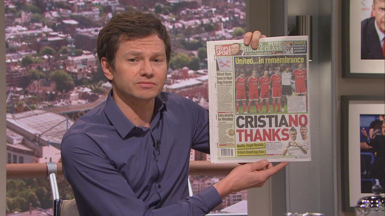Neil Ashton holds up the back page of the Sunday People on Sunday Supplement 