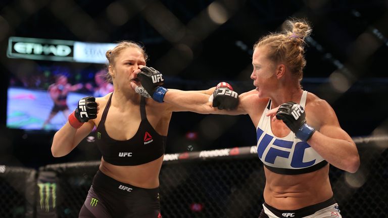 onda Rousey of the United States (L) and Holly Holm of the United States
