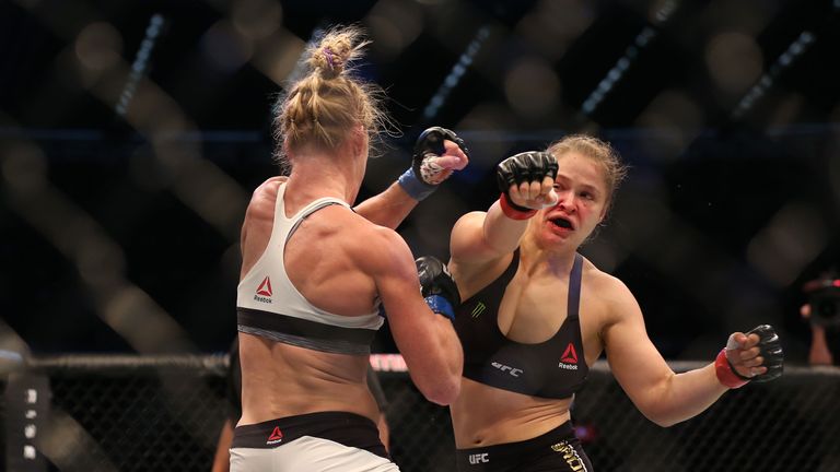 Ronda Rousey of the United States (R) and Holly Holm of the United States compete in their UFC women's bantamweight ch