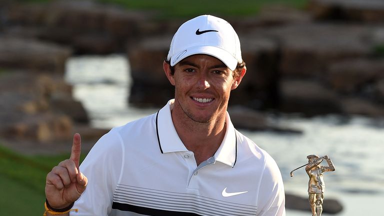 DUBAI, UNITED ARAB EMIRATES - NOVEMBER 22:  Rory McIlroy of Northern Ireland celebrates with the Race to Dubai Trophy after the final round of the DP World