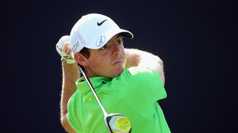 Rory McIlroy holed a bunker shot for birdie at the last to card a four-under 68