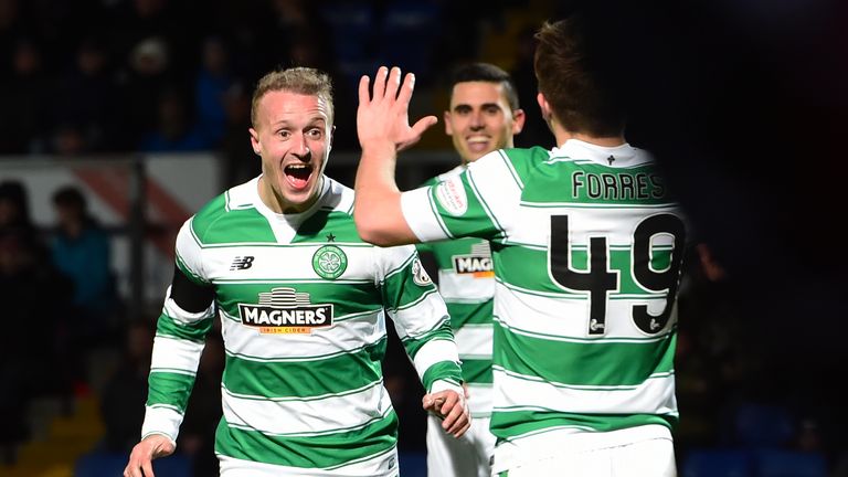 Leigh Griffiths (left) celebrates his second goal of the game with team-mate James Forrest