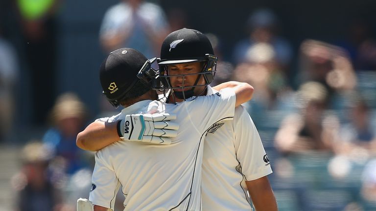 Ross Taylor of New Zealand celebrates with Kane Williamson after reaching his century during day three of the second Test 