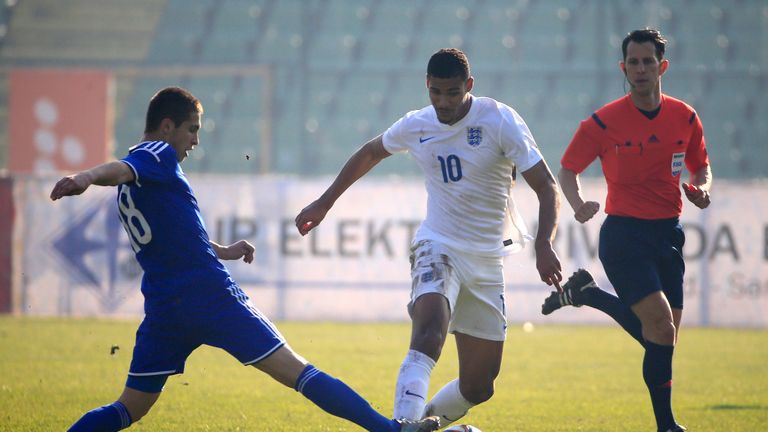 Ruben Loftus-Cheek (R) of England is challenged by Ajdin Redzic (L) of Bosnia during the European Under 21  qualifying match