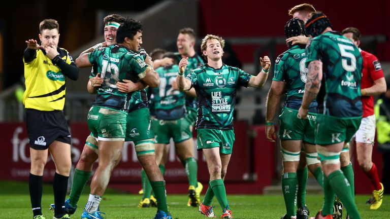 Connacht's James Connolly, Bundee Aki and Kieran Marmion celebrate after their win over Munster