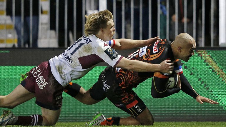 Exeter Chiefs wing Olly Woodburn scores his team's fourth try against Bordeaux-Begles